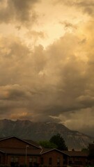 Wall Mural - Vertical Stormy sunset timelapse over church in Utah as color fades and lightning flashes over Timpanogos Mountain.
