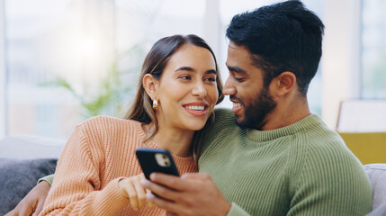 Poster - Couple, phone and smile on sofa for social media, reading notification or scroll online shopping app at home. Happy man, interracial woman or smartphone to search digital news, mobile blog or website