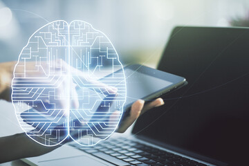 Poster - Double exposure of creative human brain microcircuit and hand working with a digital tablet on background. Future technology and AI concept