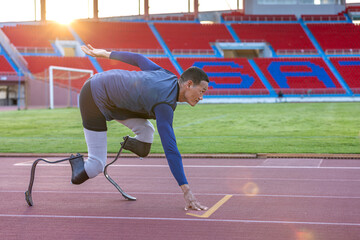 Asian para-athlete with prosthetic blades leg in stadium practicing workout for Paralympic running competition. Amputee sportsman runner practicing running workout. Disabled athlete man sport concept.