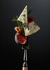 Wall Mural - Blue cheese with figs, walnuts, and rosemary.