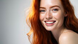 Redhead woman smiling whit perfect skin and copy space for your advertisement, skincare concept.