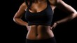 © kiki__ - Sexy girl perfect body and belly. Fitness sporty woman showing her trained body, Healthy fitness concept. black background.