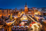 Fototapeta  - Beautifully lit Christmas fair in the Main City of Gdansk at dusk. Poland