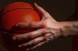 a close-up shot of a hand gripping a basketball