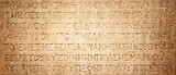 Fototapeta  - Ancient Greek text. Ancient Greek is the language of the empire of Alexander and the kingdom of the Diadochi, the Roman Empire. Background on the theme of ancient culture, archeology and history.