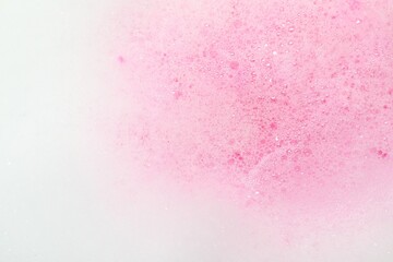 Wall Mural - Colorful foam after dissolving bath bomb in water, closeup