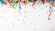 Background with colored confetti and streamers isolated on white background for birthday party or New Year's festivities and copy space