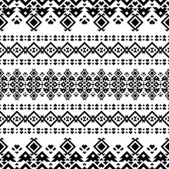 Seamless ethnic pattern. Folk ornament style. Tribal background design with abstract geometric shape. Black and white. Design for carpet, curtain, textile, fabric, mat, embroidery, fashion, ikat.