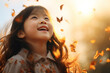 Happy asian little girl excited looking up in the butterflies