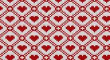 Fototapeta  - Red geometric and heart on white knitted pattern, Festive Sweater Design. Seamless Knitted Pattern