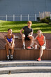 © Drobot Dean - Group of three fitness people resting after workout outdoors