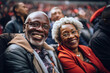 Joyful senior black couple enjoying a live sports event together surrounded by a vibrant crowd depicts happiness togetherness and shared experience