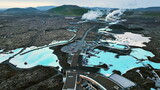 Fototapeta Konie - Aerial view of Blue Lagoon Spa, Iceland. Flying over Geothermal hot spring.