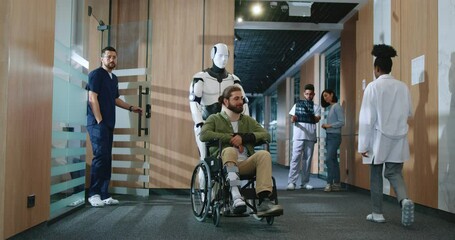 Wall Mural - Automated robot nurse assisting young male patient with injuries and using wheelchair to navigate the hospital. Helpful robotic assistant employed in clinic. Concept for future technologies.