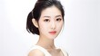 © mashimara - Elegant portrait of an Asian woman with flawless skin and an exquisite hairdo, grace and beauty against a soft white background.