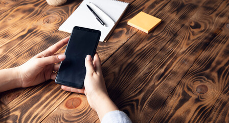 Canvas Print - cropped view of woman holding digital tablet and blank screen with copy space