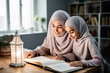 © Bojan - Muslim Mother and Daughter Embrace the Joy of Homework