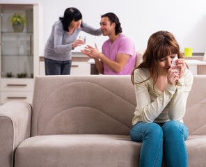 Wall Mural - Young family and mother-in-law in family issues concept