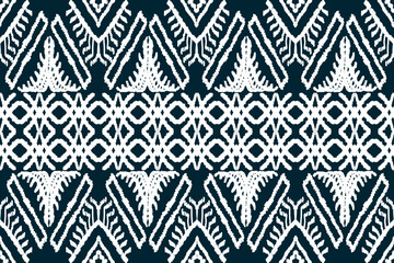 Ethnic ikat seamless pattern in tribal. Aztec geometric ethnic ornament print. Ikat pattern style. Design for background, wallpaper, illustration, fabric, clothing, carpet, textile, batik, embroidery.