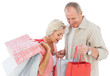 Digital png photo of happy senior couple with shopping bags on transparent background