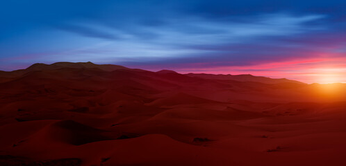 Wall Mural - Sand dunes in the Sahara Desert at amazing sunrise, Merzouga, Morocco - Orange dunes in the desert of Morocco - Sahara desert, Morocco