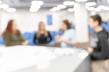 Businesswoman leading a master class, seminar or lesson in the office. Blur. High quality photo