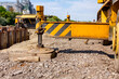 © Roman_23203 - Hydraulic crane foot is supported by metal plate for safety, lateral stabilizer