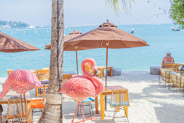 Visit a popular pink flamingo concept restaurant in a cafe next to the sea, Sue Flamingo, Ao Yon Beach, Phuket Thailand