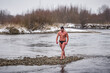 Man walrus after winter swimming in ice cold river water