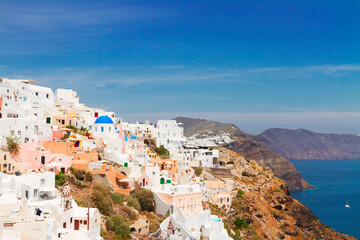 Canvas Print - Oia, traditional greek village and Aegan sea, Greece