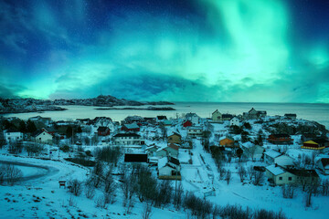 Wall Mural - aurora borealis over snowy a nordland village of moskenes at lofoten islands, norway