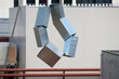 © Luka - Tubes of the ventilation ducts made of galvanized steel hanged on the rope