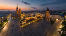 Krakow, Poland, Main Square Night Panorama From The Air With Cloth Hall And St Mary's Church