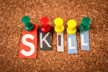 Wall Mural - skill concept. letters pinned to a cork notice board