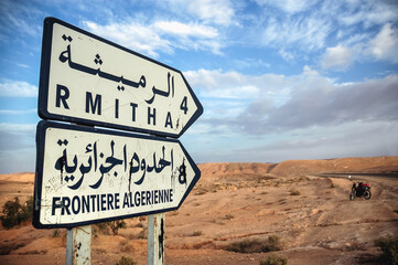 Poster - Road signs in Ain El Ouchika town near border with Algeria