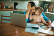 © Geber86 - Adorable little daughter kissing stressed father on cheek at home