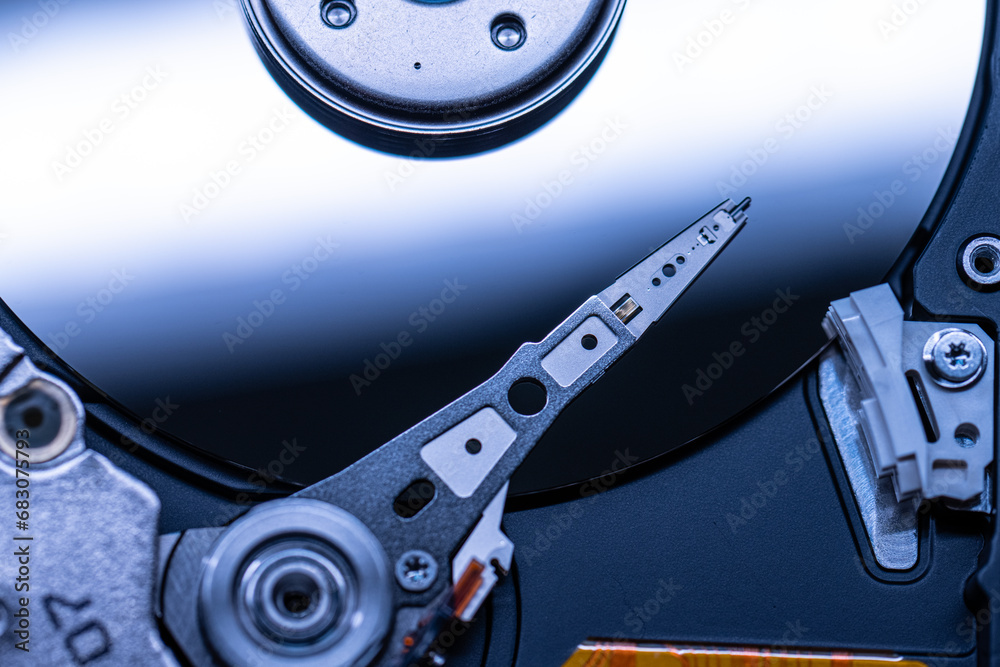 Read and write head of a hard drive. Stock Photo | Adobe Stock