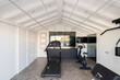 © ADDICTIVE STOCK - Home gym with exercise equipment
