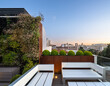© ADDICTIVE STOCK - Rooftop terrace with sitting bench