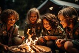Fototapeta  - Joyful Children Roasting Marshmallows at a Campfire Evening
