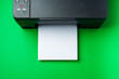 canvas print picture - Modern printer with paper on green background