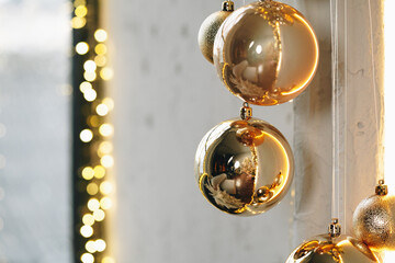 Wall Mural - Golden Christmas baubles decoration close up .Holiday concept.