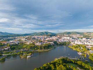 Wall Mural - Aerial panorama view of Sunflower Building at Lam Vien Square in Da Lat City. Tourist city in developed Vietnam. Center Square of Da Lat city with Xuan Huong lake