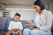© Siphosethu/peopleimages.com - Mother, child and scolding or discipline, tablet and punishment at home. Parent and daughter, communication and disappointed for cyberbullying, bad behaviour and frustrated for digital mistake