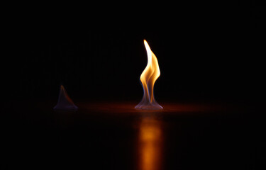 Wall Mural - flame, heat and fire start with black background with sparks, smoke and light from burning in studio