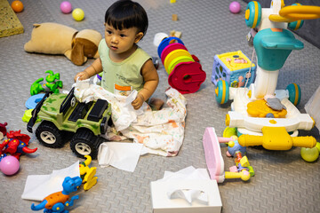 Children Messy Playing In The Living Room.