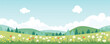 Beautiful spring landscape, blooming daisies, spring yellow, red and white flowers. Panorama of spring green fields, meadows against the backdrop of hills and amazing clouds in the blue sky.   