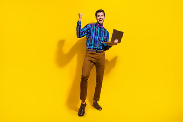 Aufkleber - Full body photo of satisfied ecstatic man wear stylish shirt vintage bow tie hold laptop win bet isolated on yellow color background