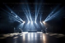 Illuminated Empty Stage Lighting Set For A Concert. The Vibrant Lighting And Empty Space Create An Anticipatory Atmosphere, Awaiting The Energy And Performances Of Artists In The Spotlight.